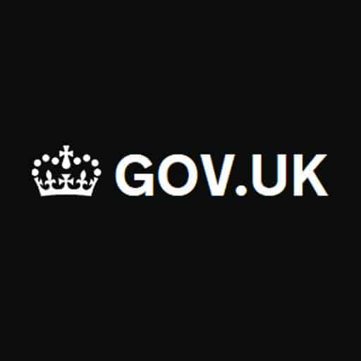 White Gov UK logo with graphic of a crown, against black background