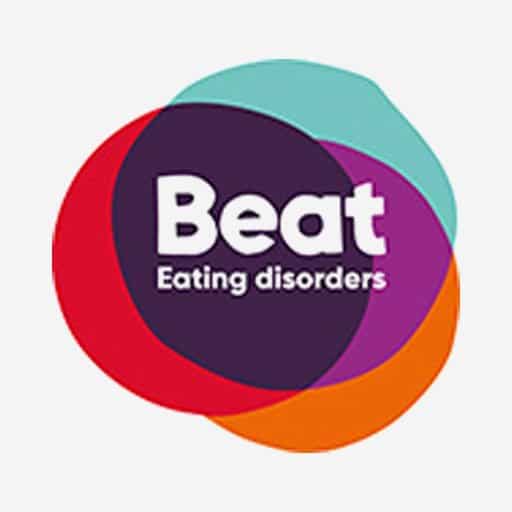 Colourful Beat logo, made up of overlapping circles in different colours with "Beat, Eating disorders" in white text in the middle, against a light grey background.
